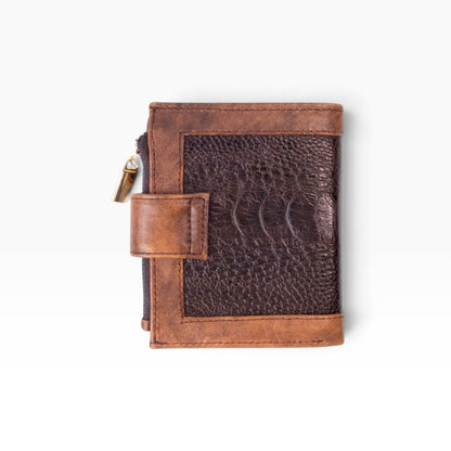 Cartera mosvartimx modelo Bolivia de piel bovina y avestruz con cierre y broche de lengüeta en tonos café.