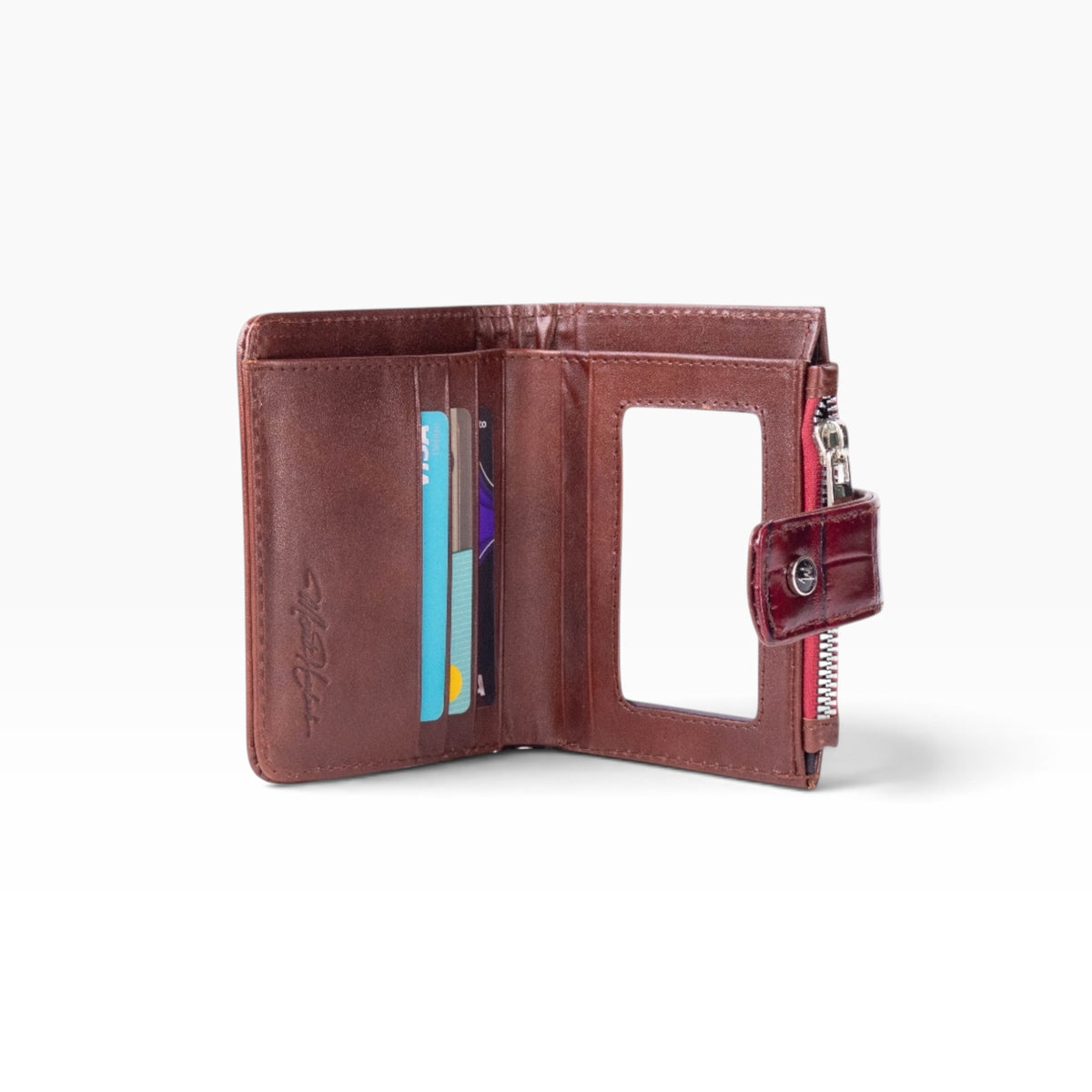 Cartera mosvartimx modelo Bolivia de piel bovina color café con tarjetero, ventana para ID y cierre lateral rojo.