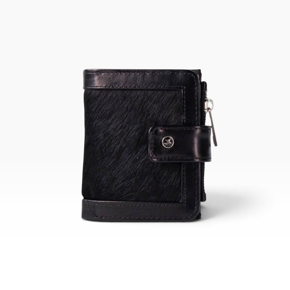 Cartera mosvartimx modelo Bolivia de piel bovina negra con textura de pelo y cierre de broche elegante