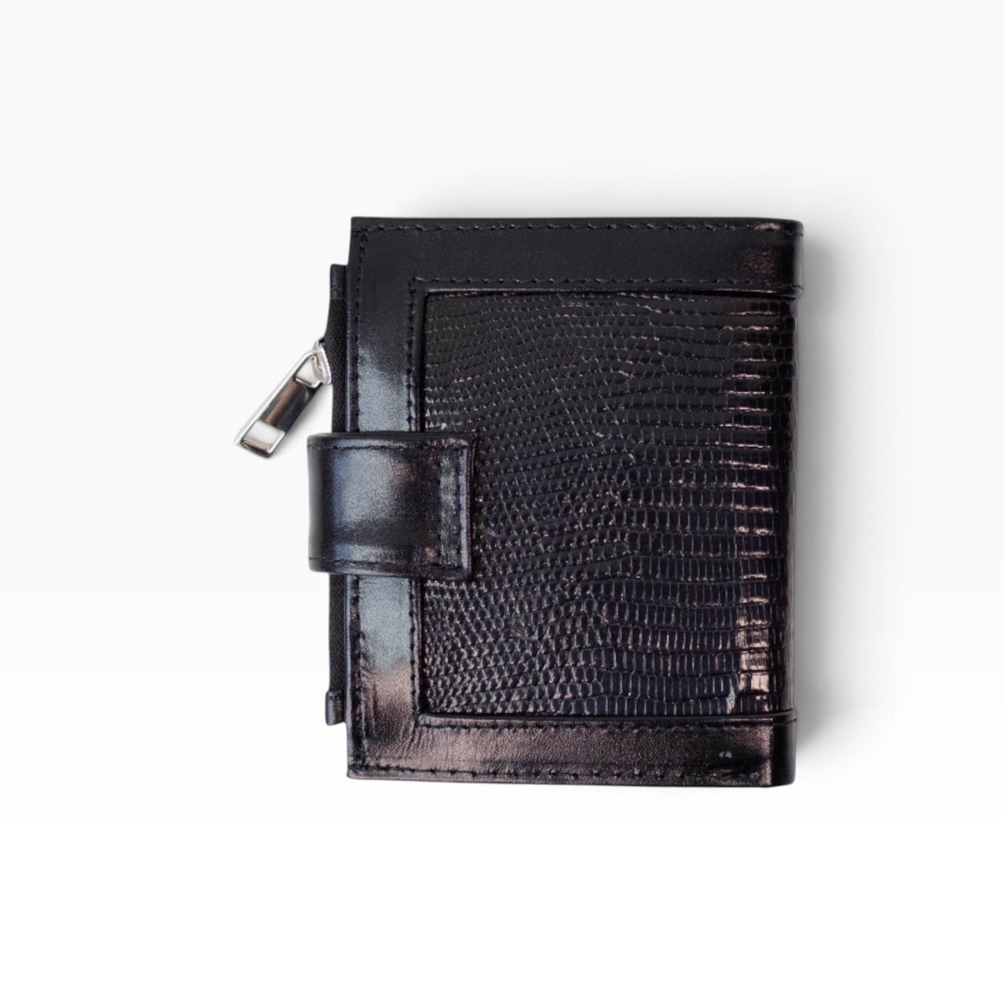 Cartera para dama mosvartimx modelo Bolivia en piel negra con textura exótica y cierre de broche tipo lengua