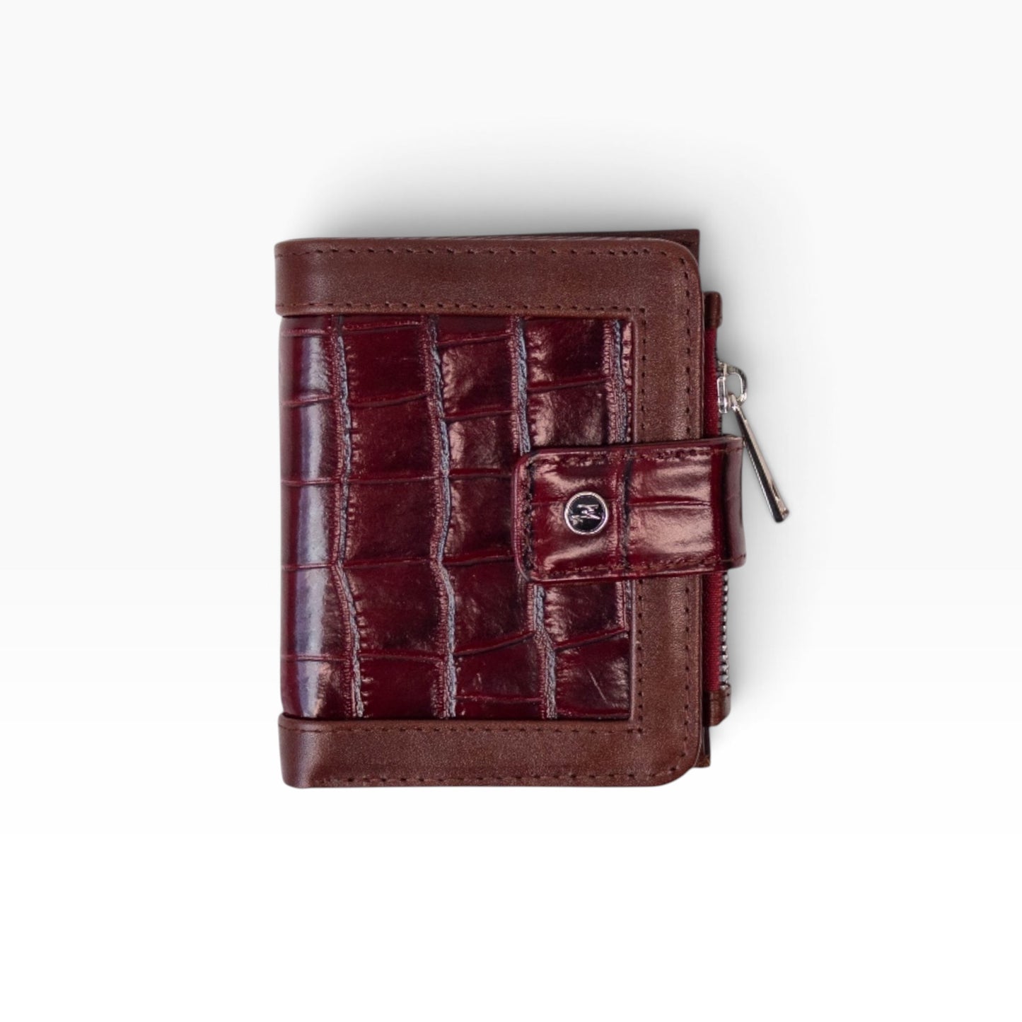 Cartera mosvartimx modelo Bolivia en piel bovina roja con grabado de cocodrilo y cierre de broche tipo lengua.