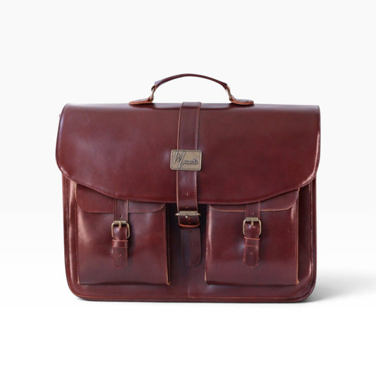 Portafolio mosvartimx tipo messenger de cuero color miel con hebillas metálicas y diseño artesanal ejecutivo