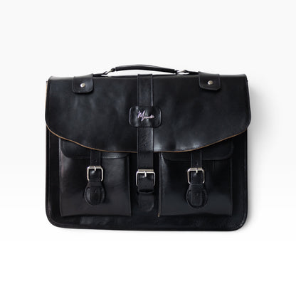 Portafolio mosvartimx tipo messenger en cuero negro con hebillas metálicas y diseño ejecutivo artesanal